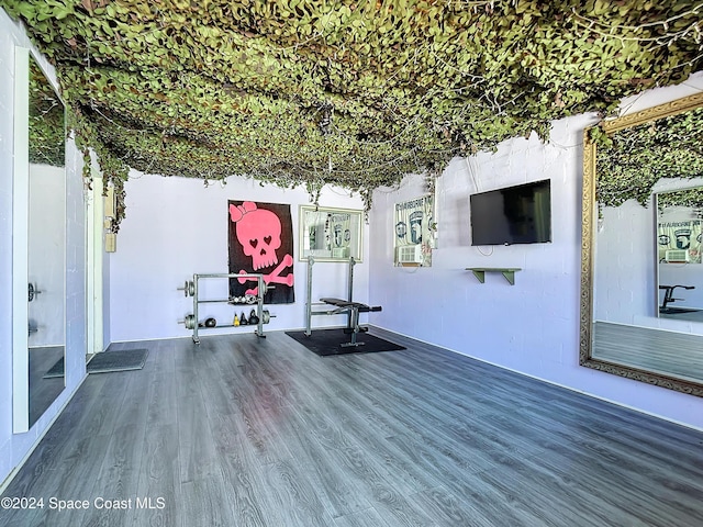 1037 Poinsetta St, Cocoa, FL 32927 - unfurnished living room featuring wood finished floors