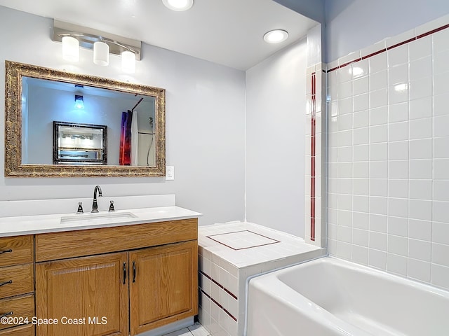 1037 Poinsetta St, Cocoa, FL 32927 - full bathroom with a tub to relax in and vanity