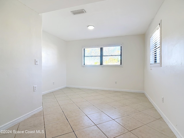 view of tiled spare room