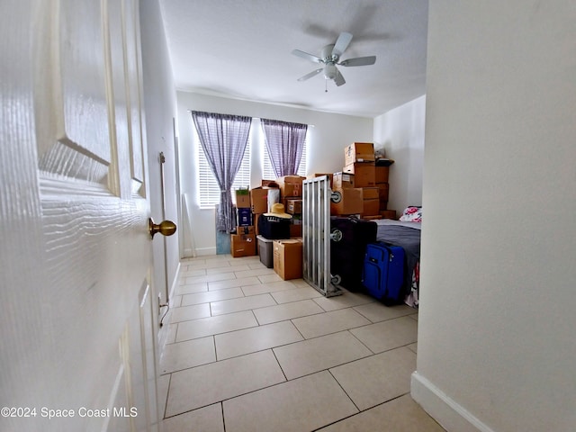 storage room with ceiling fan