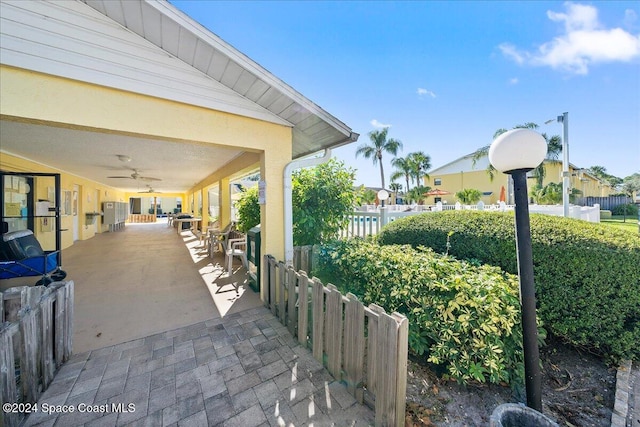 view of patio / terrace with ceiling fan