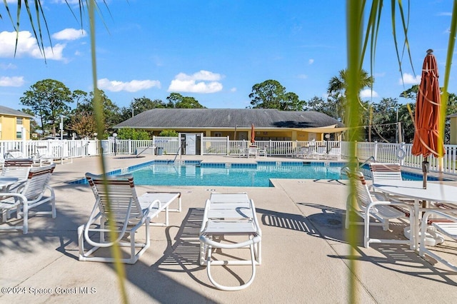 view of pool with a patio area