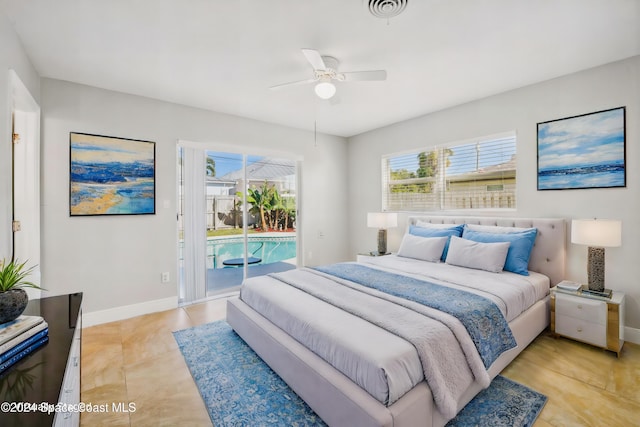 bedroom with access to outside, multiple windows, ceiling fan, and light tile patterned floors