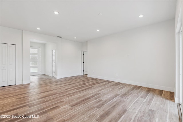 empty room featuring light hardwood / wood-style floors