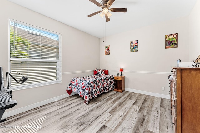 bedroom featuring ceiling fan and light hardwood / wood-style flooring