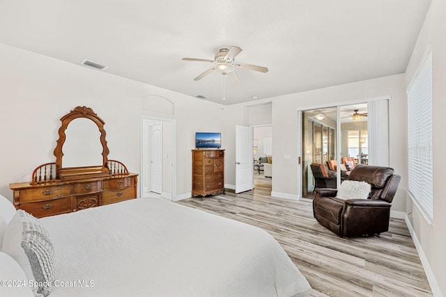 bedroom with access to exterior, light hardwood / wood-style flooring, and ceiling fan