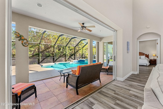 interior space featuring ceiling fan