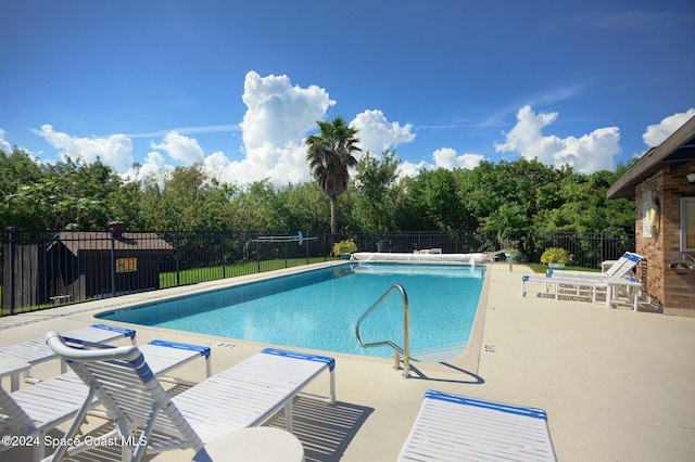 view of pool featuring a patio