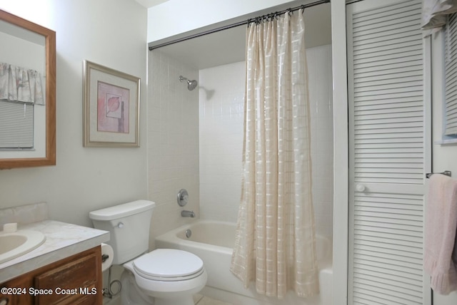 full bathroom featuring vanity, toilet, and shower / tub combo with curtain