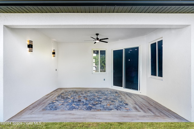 view of patio with ceiling fan