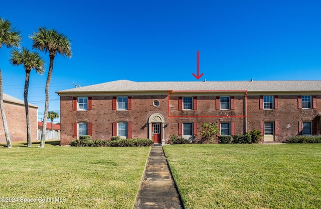 view of front of property with a front yard