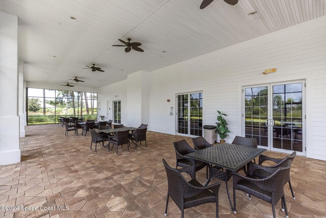 view of patio featuring french doors and ceiling fan