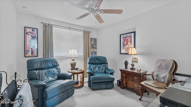 sitting room featuring carpet flooring and ceiling fan