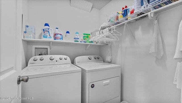 laundry area with washer and clothes dryer