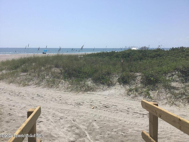 view of water feature featuring a beach view