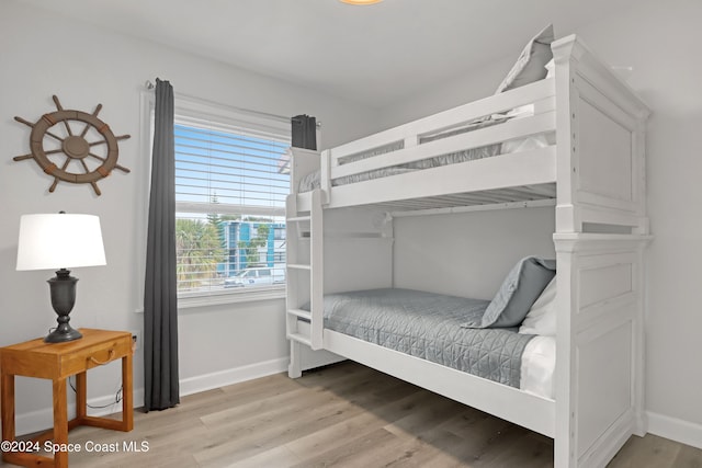 bedroom with light hardwood / wood-style flooring