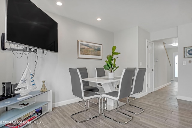 dining space featuring light hardwood / wood-style flooring