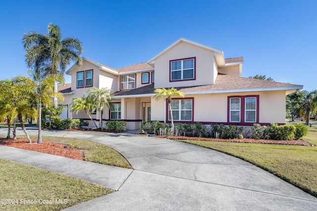 view of front of house featuring a front lawn