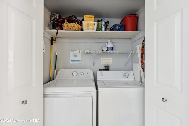 washroom with independent washer and dryer