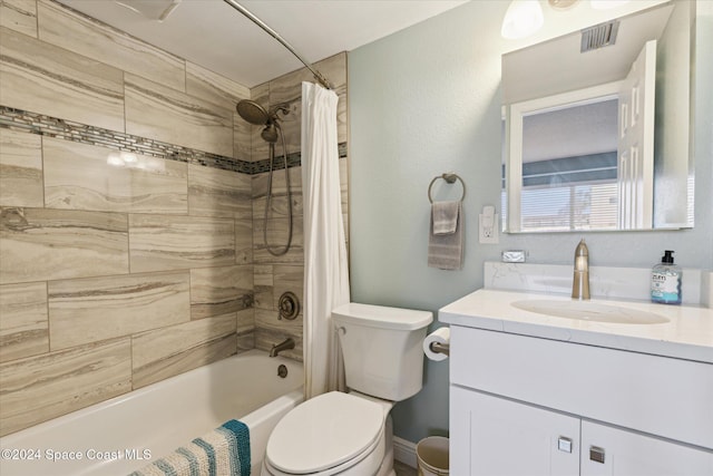 full bathroom featuring vanity, toilet, and shower / bath combo with shower curtain