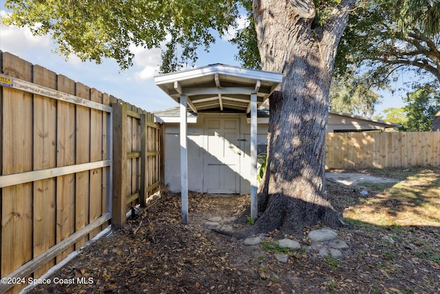 exterior space with a storage shed