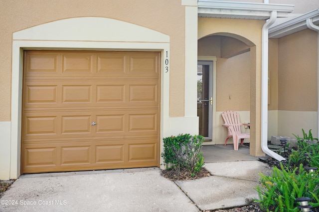 garage with driveway