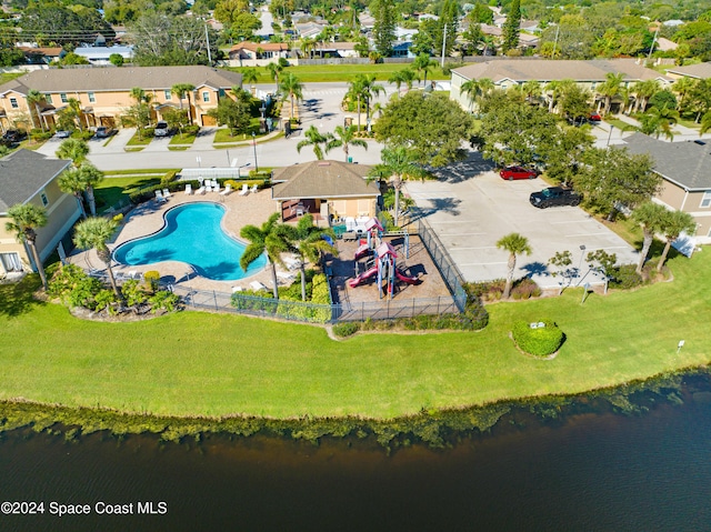 aerial view with a water view and a residential view