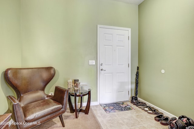 sitting room featuring baseboards