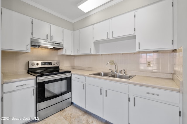 kitchen with stainless steel electric stove, crown molding, sink, light tile patterned floors, and white cabinetry