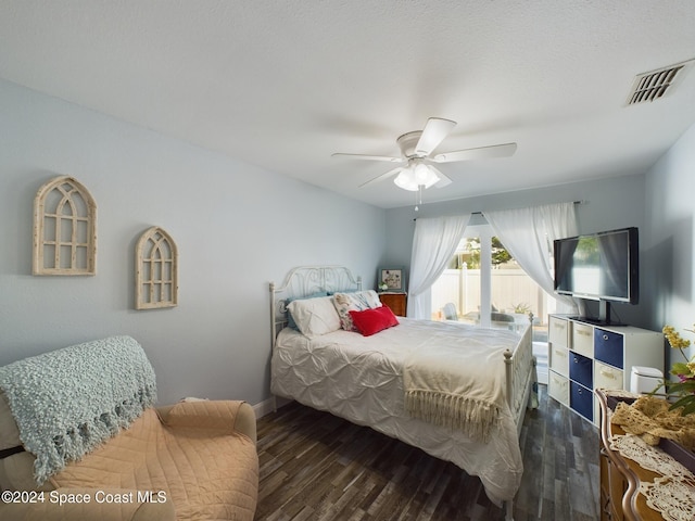 bedroom featuring ceiling fan and dark hardwood / wood-style flooring