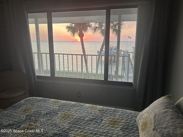 bedroom with a water view