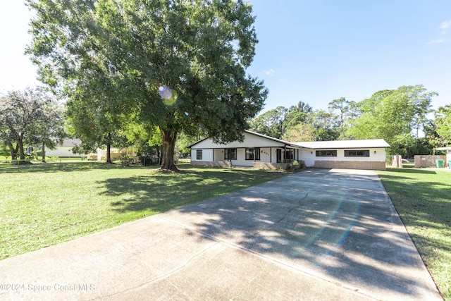 view of front of house with a front lawn