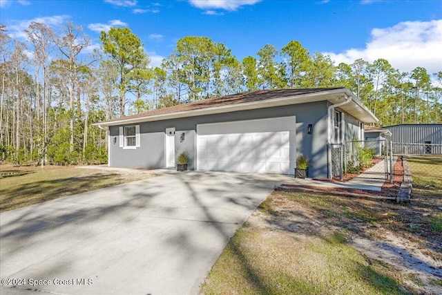 view of property exterior with a garage