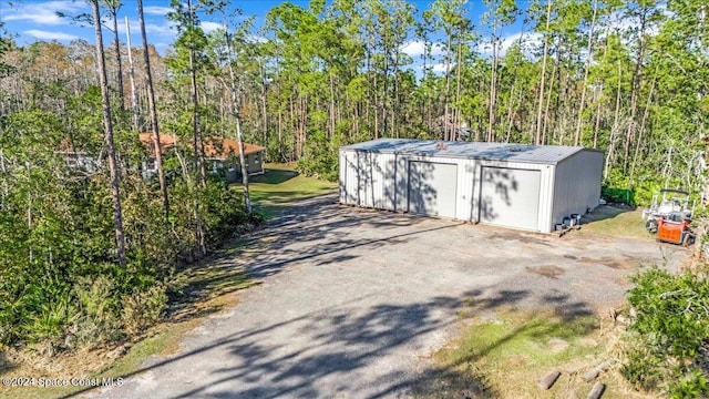 view of outdoor structure featuring a garage