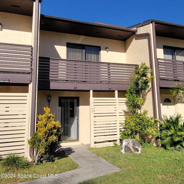 exterior space with a balcony