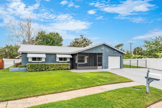 ranch-style home featuring a front yard and a garage