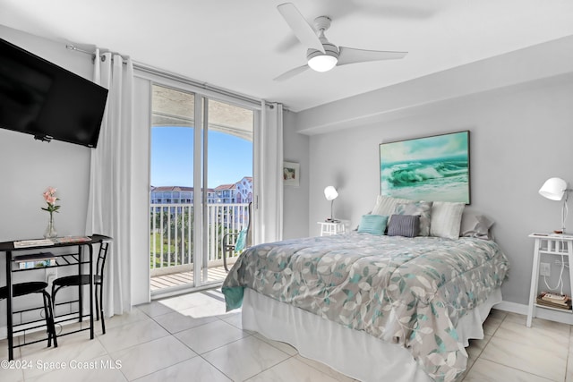 tiled bedroom with ceiling fan and access to exterior