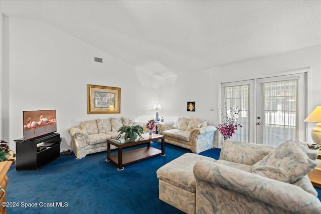 carpeted living room featuring french doors and lofted ceiling