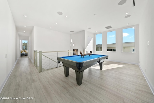 game room with light wood-type flooring and billiards