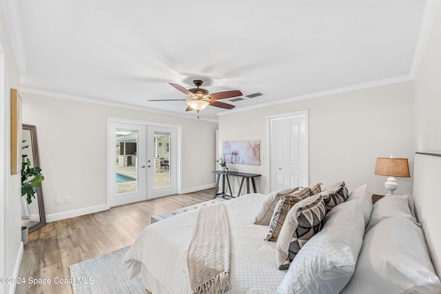 bedroom featuring access to exterior, french doors, light hardwood / wood-style floors, and ornamental molding