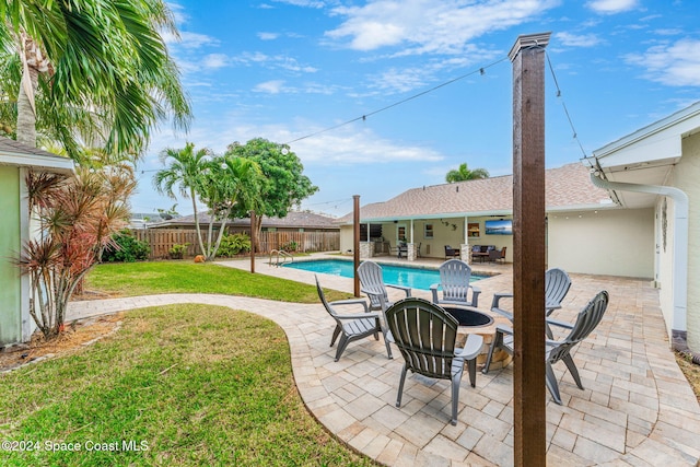 view of patio / terrace featuring a fenced in pool