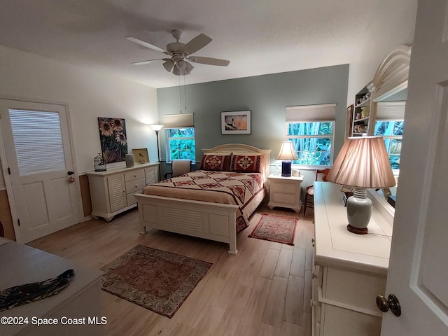 bedroom featuring ceiling fan and light wood-type flooring