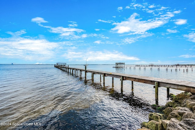 view of dock with a water view