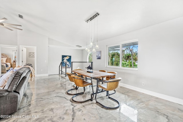 dining room with vaulted ceiling and ceiling fan with notable chandelier