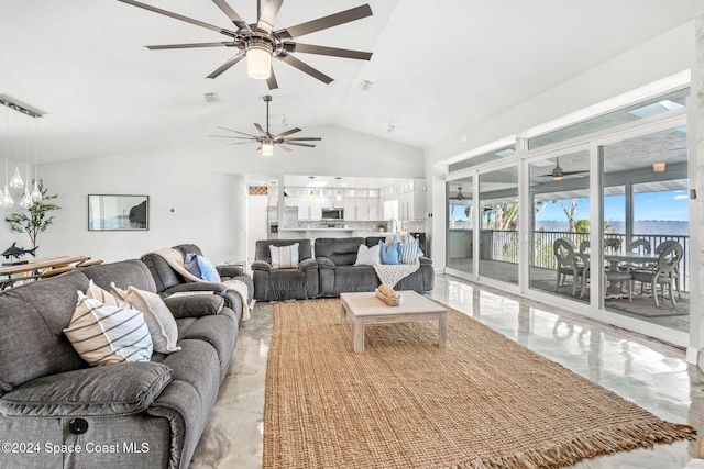 living room with ceiling fan and lofted ceiling