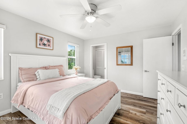 bedroom featuring ceiling fan and dark wood-type flooring