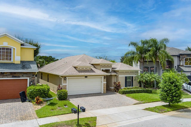 view of front of house with a garage