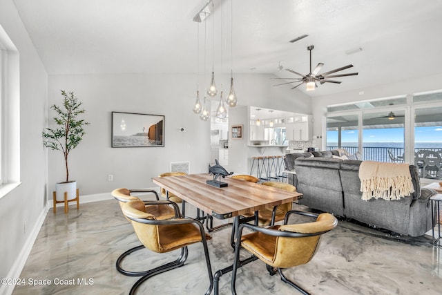100 Bonita St, Titusville, FL 32780 - dining room featuring a ceiling fan and lofted ceiling
