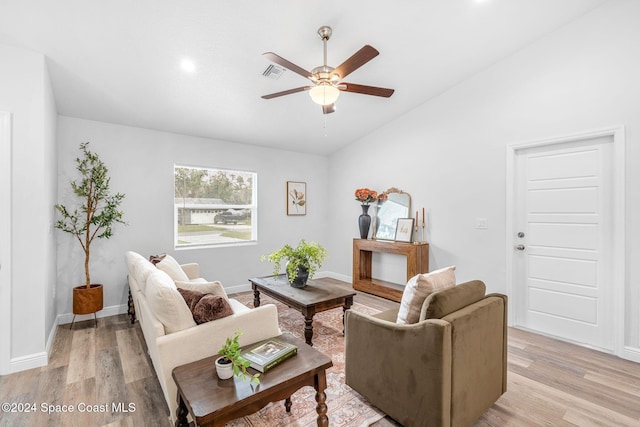 living room featuring ceiling fan and light wood-type flooring