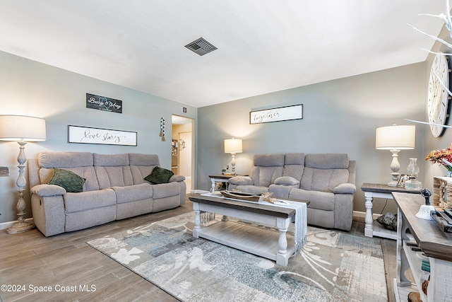 living room featuring light hardwood / wood-style flooring